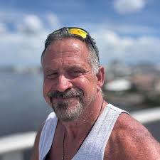 How to unlock a stuck steering wheel in a 2007 BMW 335i?