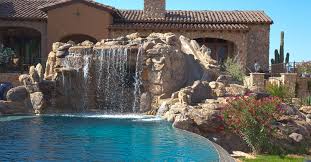 If there's no area to pump the water to, then you'll need to do some major dig a new hole for the waterfall to come out from for am t junction pipe to force water upwards and cover it. Swimming Pool Waterfalls Construction Phoenix Az Area No Limit Poolsno Limit Pools