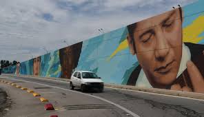 Aeropuerto de Carrasco inaugura el mural “Uruguay al Mundo” creado con  motivo del décimo aniversario de su terminal. La obra artística, ubicada en  el viaducto frente al ingreso de la terminal, retrata
