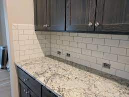 White Subway Tile With Gray Grout And Ice Blue Granite White Granite Countertops White Ice Granite White Marble Countertops