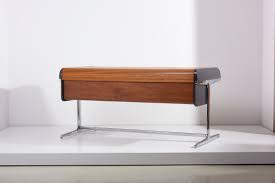 There are three wide drawers and three small drawers. Early Tambour Roll Top Desk By George Nelson For Herman Miller