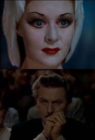 The Red Shoes 1948 Moira Shearer as Vicky Page during her ballet of the  Swan Lake at the Mercury Theater and Anton Wolbrook as Boris Lermontov  observing Vicky dance. He becomes convinced