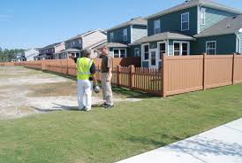 A man needs a fence around his land. How Is A Good Fence Contractor Selected Hurricane Fence