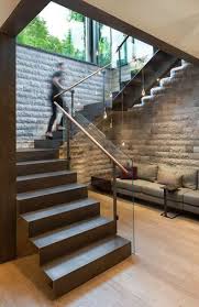 The Modest Amount Of Space Dedicated To The Stair Well Could Have Felt Hemmed In And Claustrophobic With An En Stairs Design Modern Canadian House Modern House