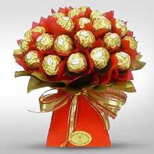 ferˈrɛːro roʃˈʃe) is a chocolate and hazelnut product produced by the italian confectionery company ferrero. Ferrero Rocher Bouquet Flowerzila Com