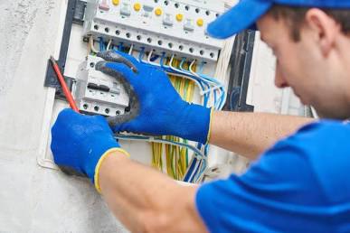 Licensed electrician inspecting a main switchboard panel, AI generated