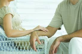 A few of us will let you know if we don't as well in a hot second. Couple Sitting Together Woman Touching Man S Arm Cropped View Stock Photo Dissolve