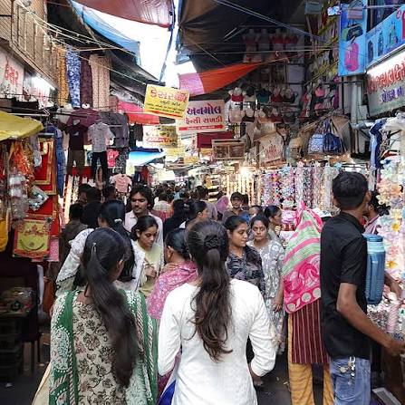 CHAUTA BAZAAR" A BUSY LADIES STREET MARKET IN SURAT, INDIA. The market has  a buzzing atmosphere and expect to haggle down any price that you're given  by the trader (it's common