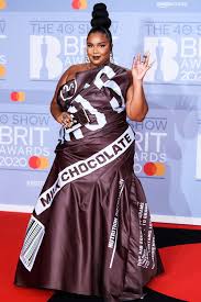 Lizzo Shows Off Her Sweet Style In A Chocolate Bar Inspired Dress At The 2020 Brit Awards In 2020 Nice Dresses Inspired Dress Dresses
