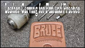 Next, the tracing paper went over the leather, with some weights on the corners. Leather Carving Designs For Fun And Practice Leathercraft Tutorial Bruce Craft Ideas By Bruce Cheaney