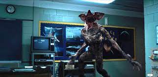 A background that has the shadow monster from season 2 and a iconic moment from season 1. Stranger Things Demogorgon Mark Steger Details Playing Monster Indiewire