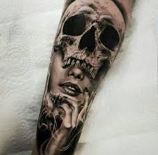 This is a perfect couple tattoo idea. Girl Face And Skull Tattoo Design