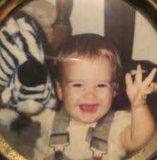 Twenty-one. I like the second photo because it captures her in a natural  moment and it's how I see her. I like the first photo because her smile  lights up my world.