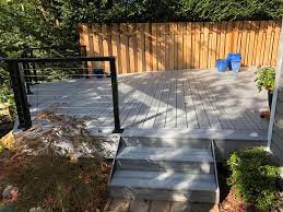 The foggy wharf color would look amazing on a deck by the ocean or a lake. Foggy Wharf Trex Deck With Cable Railing Deck Masters Llc