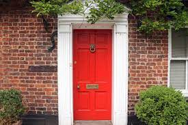 Red door with a dramatic black exterior speaking of drama, this house, with its pure black siding color and splash of red on the front door, has it in spades. Scene Of The Day Cottage Doors Scene Therapy