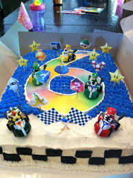 A mario kart themed birthday cake is more popular with kids, however the game is enjoyed by players of all ages. Mario Birthday Party Complete With Mario Themed Food And Games Mario Birthday Mario Birthday Party Mario Birthday Cake