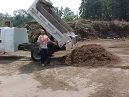 Therefore, you can either order 1 cubic yard to be delivered in a small dump truck or you can buy 36 bags weighing 40 pounds each. Mulch Dirt Trash Recycling