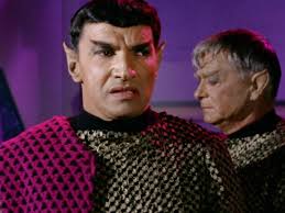 How is the ISS commander chosen? Is it the person onboard with the most  days in space? The person with the most days aboard ISS? The person who  gets chosen by the