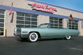 Image result for Cape Ivory 1966 Cadillac
