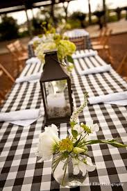 Black And White Checkered Tablecloth Fabric Southern Wedding Details Checkered Table Cloth And Handpicked Flowers Image By Richard Ellis Photograph Table Decorations Bbq Wedding Wedding Rehearsal Dinner