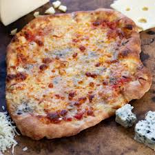Four Cheese Pizza Recipe Beyond Pepperoni Pizza Toppings Recipe Cheese Pizza Recipe Four Cheese Pizza Four Cheese Pizza Recipes