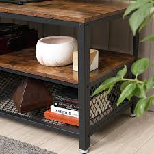 Elephance round coffee table with storage, 35.8 inch rustic wood coffee table with strong metal frame for living room, dining room, cocktail table, round sofa table (almond) 4.5 out of 5 stars 221 $159.99 $ 159. Buy Vasagle Tv Stand Lengthened Tv Cabinet Console Coffee Table With Metal Frame Wood Like Grain Industrial For Living Room Rustic Brown And Black Ultv50bx Online In Uae B07nrlk7ty