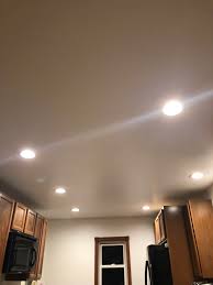 these overhead lights in our kitchen