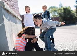 Elementary Age Bullying in Schoolyard Stock Photo by ©Lopolo 167818540