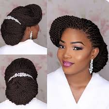 An asymmetrical braid hairstyle for weddings perfect for all girls who feel like their face is on the wider side. Braids Bridal Updo Is A Great Way To Incorporate Something Different Into Your Bridal Look It H Natural Hair Wedding Bridal Hair Inspiration Braided Hairstyles