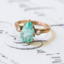 She also wore simple silver midi rings, because she likes the look, and a gold and ruby ring from her grandmother. 14 Bohemian Engagement Ring Designs For The Wild At Heart Ruffled