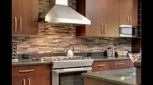 Backsplashes placed near the cooking range typically go all the way up to the bottom end of the overhead cabinets. Kitchen Backsplash With Granite Trim Youtube