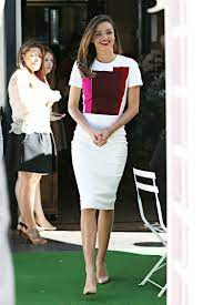 Can you spot my mini dachshund? Miranda Kerr S Victoria Beckham Dresses At Her Royal Albert Tea Line Launch Glamour