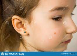 111 Child Ear Piercing Photos Free Royalty Free Stock Photos From Dreamstime