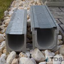 Though more expensive, complicated, and time consuming, using both pea gravel and stone together is one of the best ways to form a french drain. Polycast Drains Yard Drainage Drainage Solutions Landscaping Yard Remodel