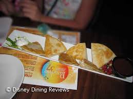 Flour tortillas, crispy battered seasonal whitefish, corn salsa, shredded cabbage, lime crema. Paradiso 37 Disney Dining Reviews