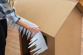 Diy Cardboard Gingerbread Playhouse For Christmas Hgtv It almost looks like gingerbread and you can fill it up with toys, presents and tons of candy. diy cardboard gingerbread playhouse for