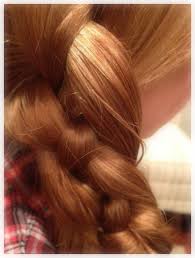 You can also make two fishtail braids, twist them together, and then twist the whole thing up for a more elaborate bun. How To Make A 4 Strand Braid Hair Tutorial