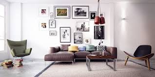 A Gallery Art Wall Adds Height Above A Low Profile Sofa Taking The Eye Upwar Scandinavian Design Living Room Living Room Design Modern Living Room Scandinavian