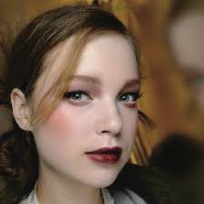 Personalized and Invertible Face De-Identification by Disentangled Identity  Information Manipulation