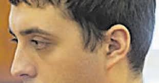 Officer says body wasn't far from house