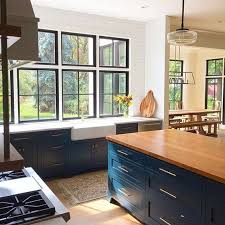 I have a soft spot for butcher block countertops. Navy Cabinets Kitchen Remodel Home Kitchens Navy Cabinets