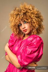In fact, tumbling curls that frame the entire head create an adorably unique look that will make you feel exceptionally beautiful. Portrait Of Attractive Retro Woman With Curly Hair In Pink Blouse Pose Embracing Stock Photo 286881770
