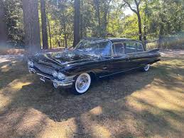Image result for Platinum Gray 1961 Cadillac