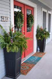 How To Make A Diy Holiday Porch Pot Everyday Teacher Style Front Porch Decorating Front Porch Christmas Decor Front Door Planters