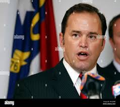District attorney Jay Gaither reads the indictment charging Elisa Baker  with murder in the death of Zahra Baker during a news conference in  Hickory, N.C., Monday, Feb. 21, 2011. (AP Photo/Bob Leverone