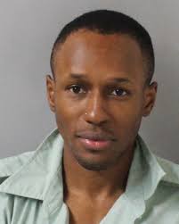 JUST IN: Jonathan Powell, 34, has been charged with aggravated robbery for  punching a 45-year-old woman in the face and taking her minivan as she  approached the intersection of Park Plaza &