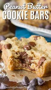 Soft And Chewy Peanut Butter Chocolate Chip Cookie Bars These Cookie Bars Peanut Butter Chocolate Chip Cookies Cookie Bar Recipes Peanut Butter Chocolate Chip