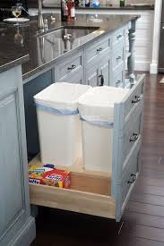 The garbage containers measure 14.38 x 22 x 19.25 inches that perfectly fit base cabinets with 14.5 inches or the one with a larger opening. 41 Sneaky Ways To Hide A Trash Can In Your Kitchen Digsdigs