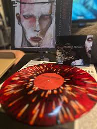 Get the limited edition brown vinyl only at Target. Vinyl comes with an  exclusive hunting ID, CD comes with an exclusive fishing ID.