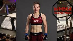 Zhang weili reacts with joe rogan after her tko loss to ufc strawweight champion rose namajunas at ufc 261: Weili Zhang